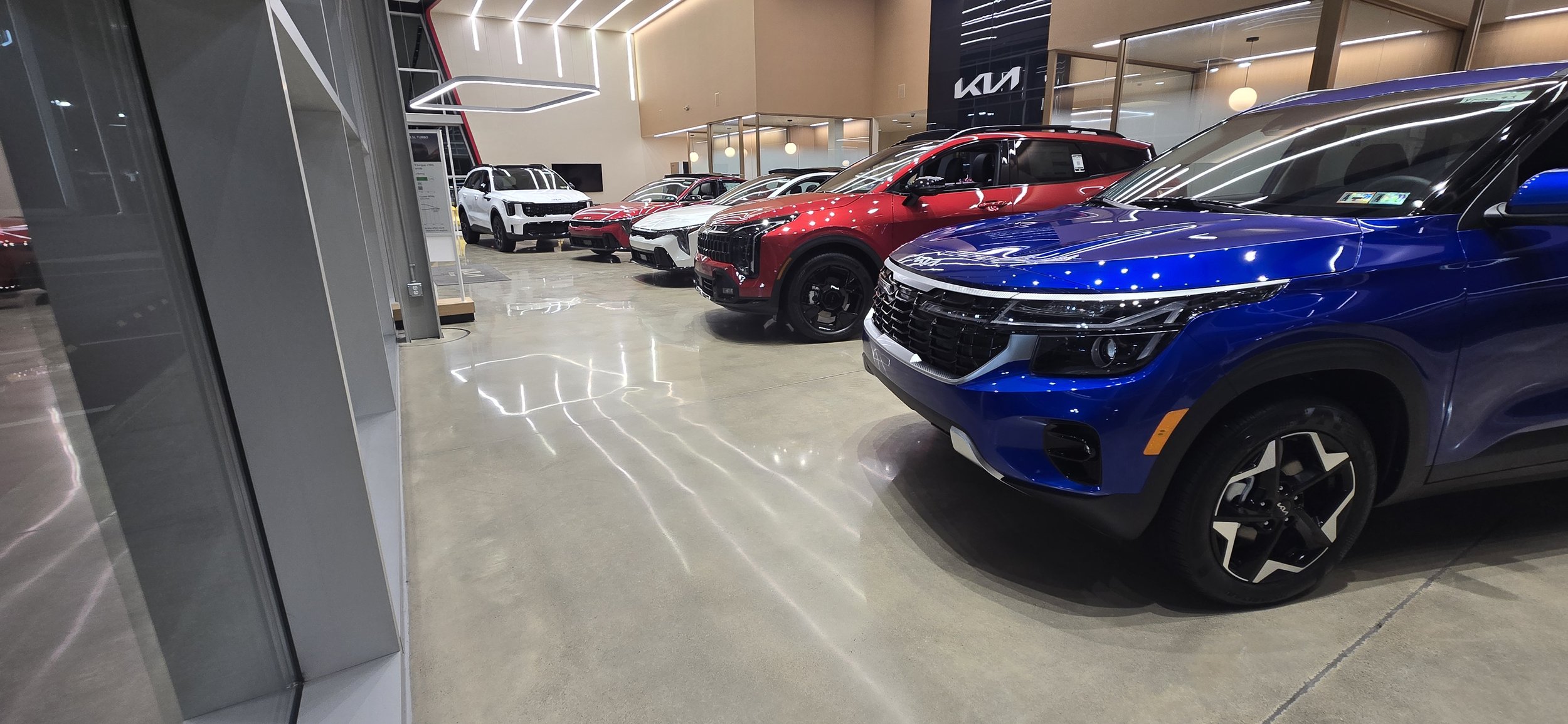 Auto dealership showroom floor polished to a shine